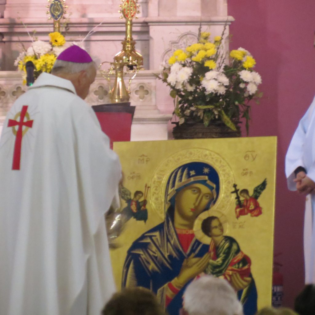 Bishop Brendan at prayer before the Icon of Mother of Perpetual Help
